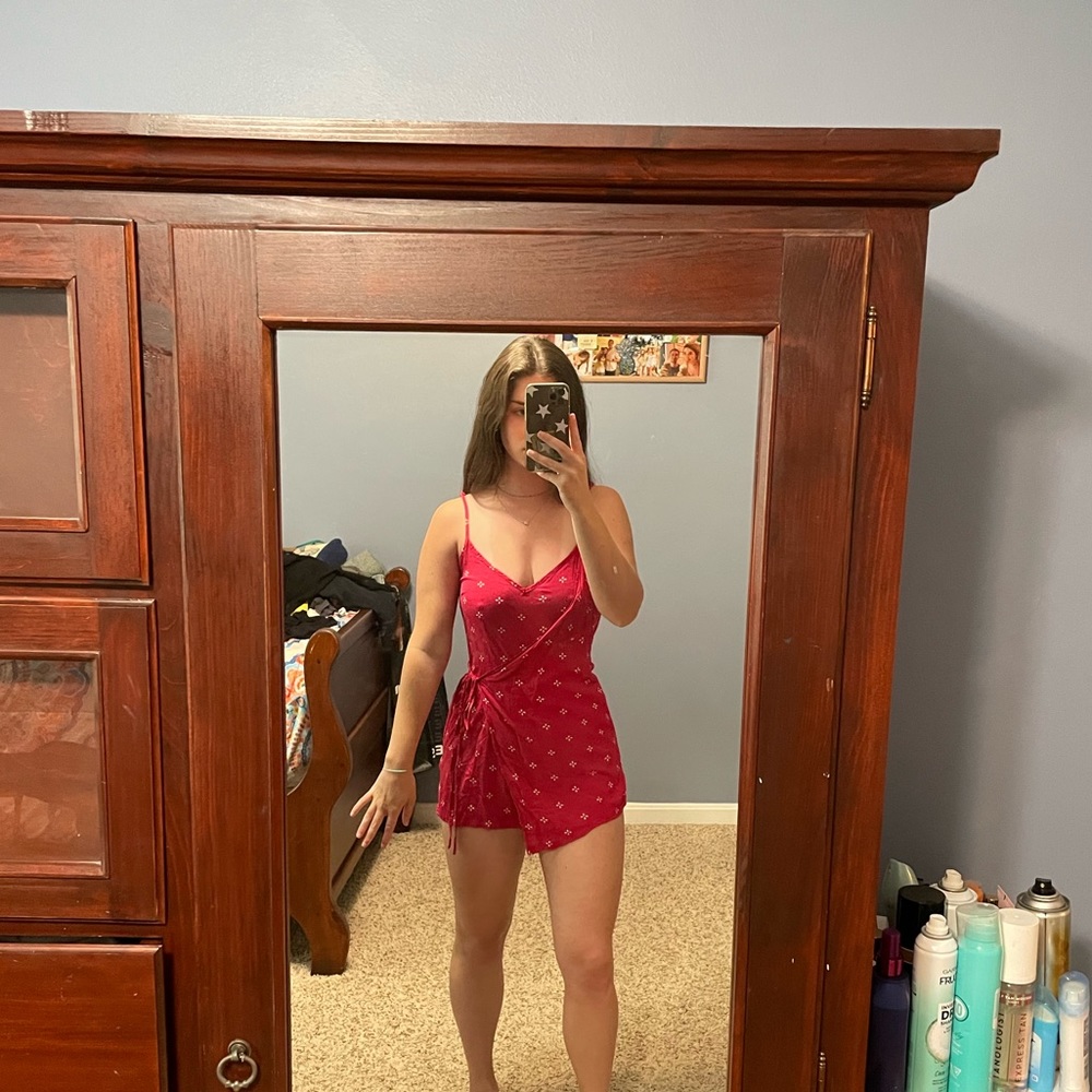 Charlotte Russe pink romper with a tie